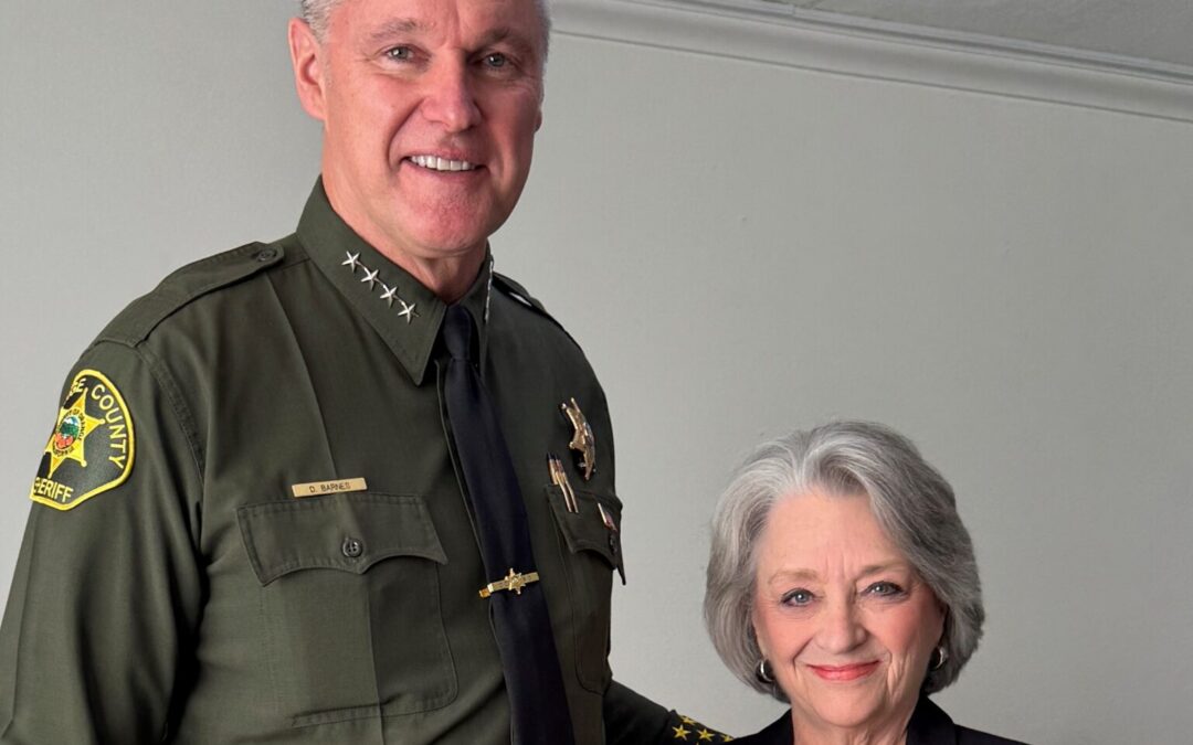 Orange County Sheriff presents interfaith community service award to Dot Leach